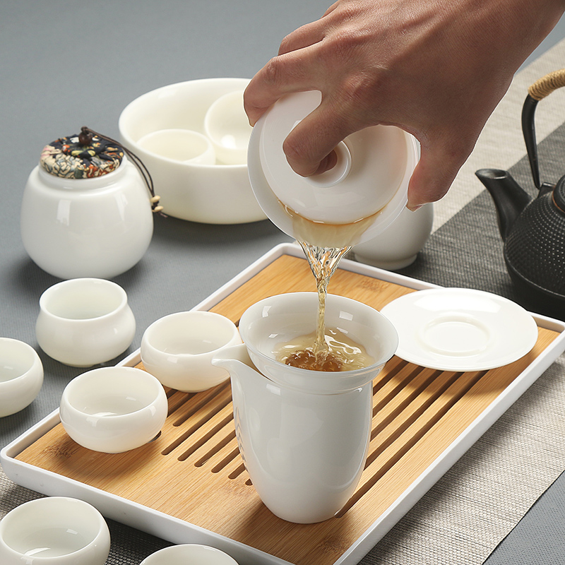 Dehua suet jade white porcelain kung fu tea set high - grade household contracted sitting room visitor GaiWanCha glass teapot
