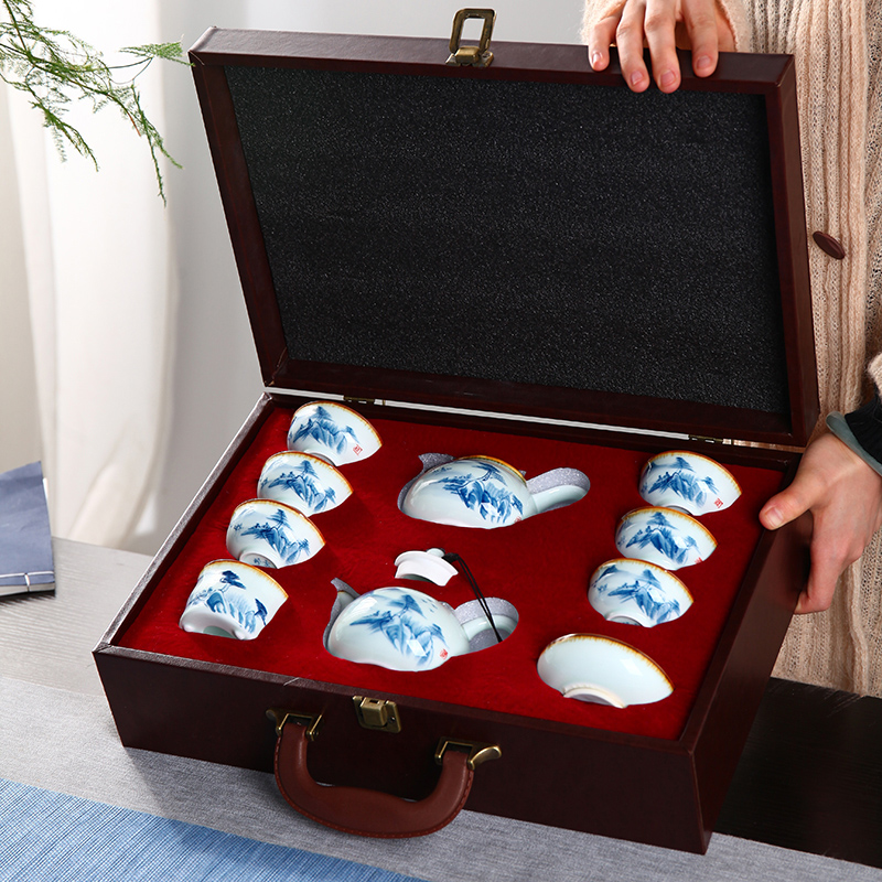 Jingdezhen hand - made of high - end kung fu tea set home sitting room is a small set of blue and white porcelain cup tea tray tea kettle