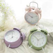 The warm candy-colored bell alarm clock loud lazy bed head night light mute fashionable primary and secondary school students