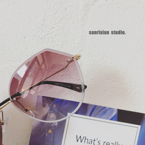 Europe and the United States cut edge new frameless sunglasses large frame personality net red star polygonal sunglasses womens glasses