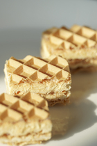 Lava Weihua biscuit cheese Chocolate sandwich with a little piece of chocolate.