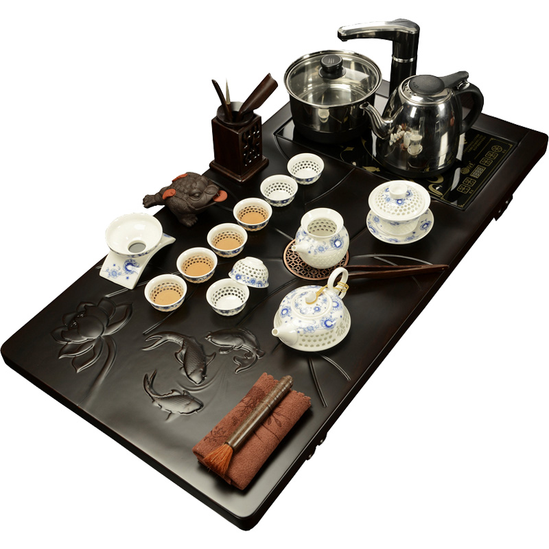 Porcelain ebony wood tea set tea tray tea sea god household and exquisite tea set four unity taking of a complete set of induction cooker