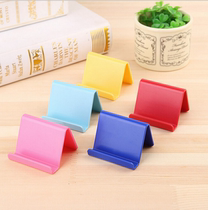 Korean creative mobile phone holder Cute candy color mobile phone holder Small portable phone fixed base Mobile phone holder
