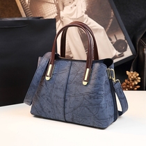 France DUDK New Womens Bag Great Brand Temperament Lacquered Leather Shell Genuine Leather Atmosphere Single Shoulder Fashion Handbag