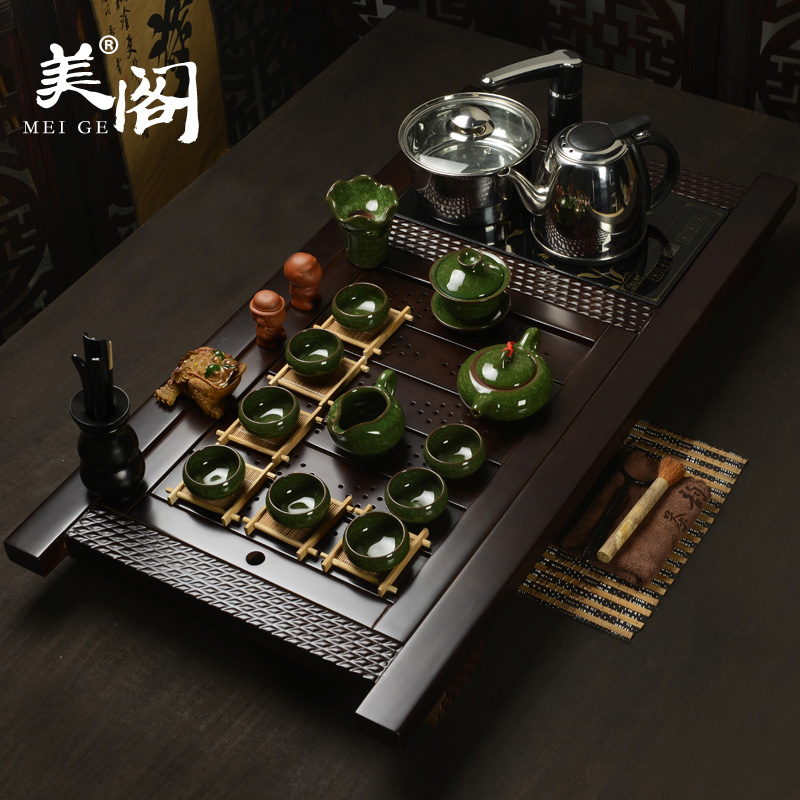 Beauty cabinet household ceramic tea set yixing purple sand of a complete set of kung fu solid wood tea tray induction cooker four unity