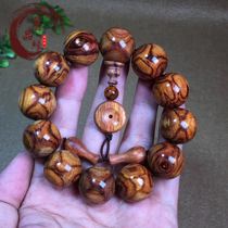 Old material l Ghost face yellow pear string 2 0 male Hainan Ghost Road Sea Yellow Granule to eye bracelet