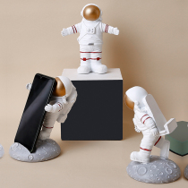 Creative astronaut astronaut mobile phone stand Nordic simple coffee table Childrens room desktop home decoration ornaments