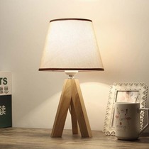 Simple modern bedroom wooden small table lamp European style fashion personality warm creative dimming led living room bedside lamp