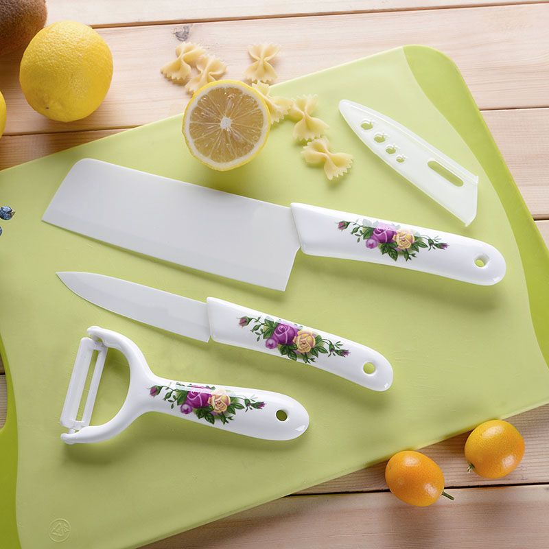 Plastic handle ceramic knife carving knife slicing knife chopper don 't rust antioxidant household kitchen three - piece suit.