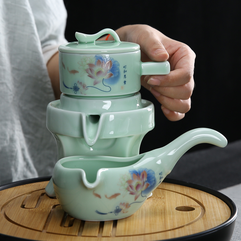 Celadon tea set home stone mill creative ceramic teapot kung fu tea cup half full automatic lazy