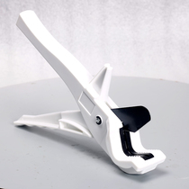 A quick cut of the plastic water pipe