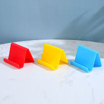 Mobile phone desktop holder simple portable mini lazy person watching TV universal plastic base gift clip