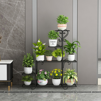 Outdoor flower shelf waterproof sunscreen Living-room Iron Art Multilayer TV Set next to a small balcony with a lot of meat