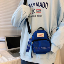 Mens bag Korean leisure shoulder shoulder bag small backpack students mobile phone key wallet Hong Kong style brand Japanese