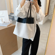 Hong Kong tide brand net red large-capacity one-shoulder handbag womens 2022 new western style woven bucket large bag