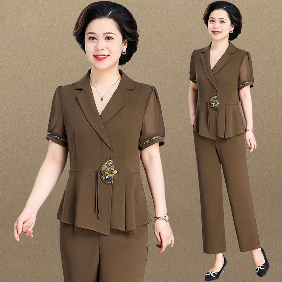 Middle-aged and elderly mothers in summer chiffon shirt short-sleeved casual suit rich lady fashionable top two-piece suit
Middle-aged and elderly mothers in summer chiffon shirt short-sleeved casual suit rich lady fashionable top two-piece suit