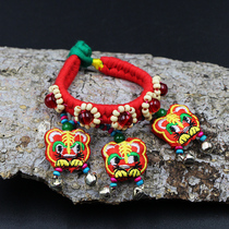Yunnan Lijiang characteristic bracelet female ethnic style hand-woven bell fabric bracelet bracelet tiger head female jewelry