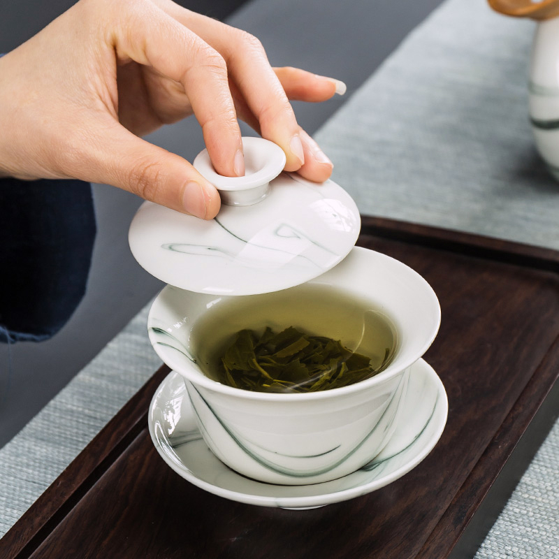 Building In hand - made kung fu tea set household contracted blue and white porcelain ceramic dehua white porcelain tea set. A complete set of tea cups