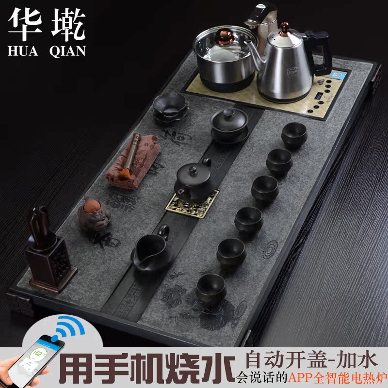 China Qian large sharply black stone tea tray and induction cooker four tea tea sea of a complete set of kung fu tea set