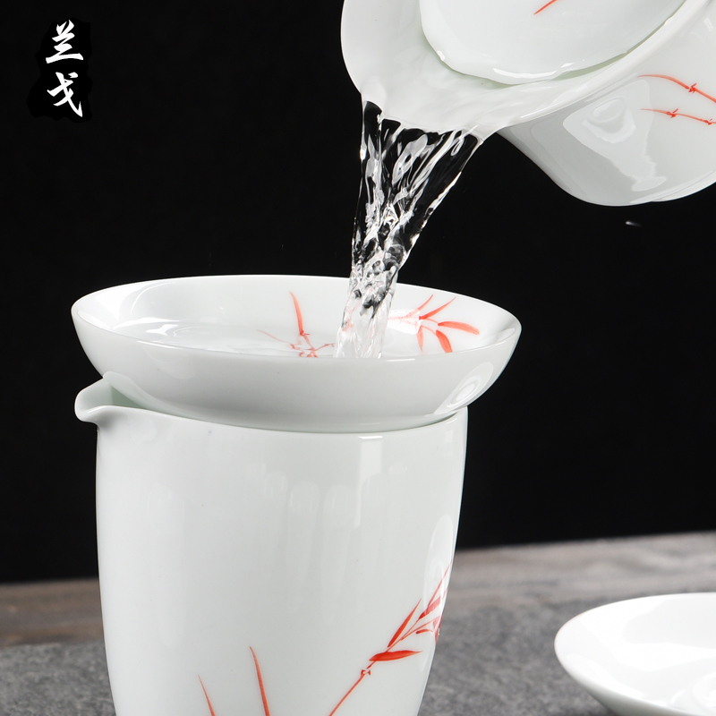 Having dehua white porcelain ceramic) kung fu tea set with parts hand - made tian, white tea filter 's tea strainer