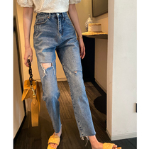 Wei Yanni Santa Rita fashion versatile asymmetric cat scratch hole thin high waisted radish jeans