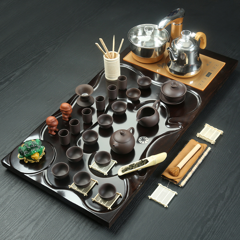 Porcelain heng tong tea cups suit household contracted purple sand pottery and Porcelain of a complete set of kung fu tea set automatic tea tea tray