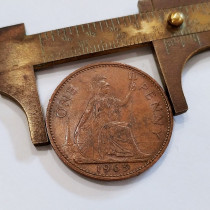 Foreign coin 9 Pintured photos J British one pence Coins Chocolate Bag Pulp 1963 European genuine foreign currency