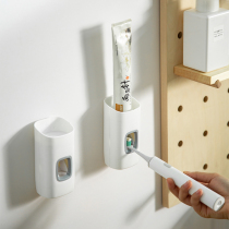 Fully automatic squeezing toothpaste artifact wall-mounted single household non-perforated suction wall type high-end pressing toothbrush holder rack