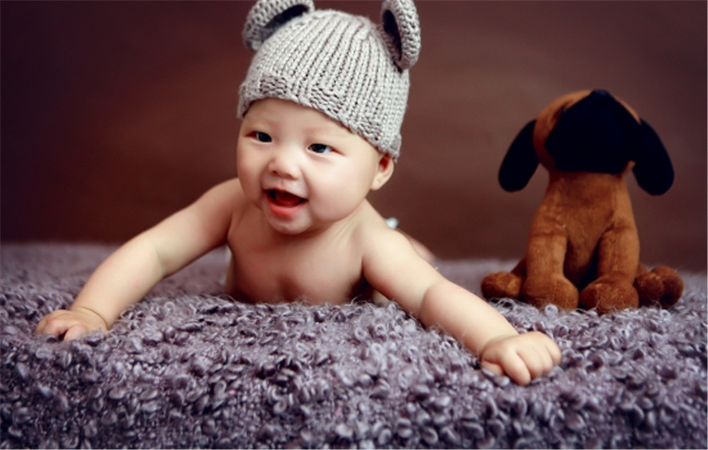 爱打扮(www.idaban.cn)，冬季给宝宝买围巾，这四种款式请多留心41