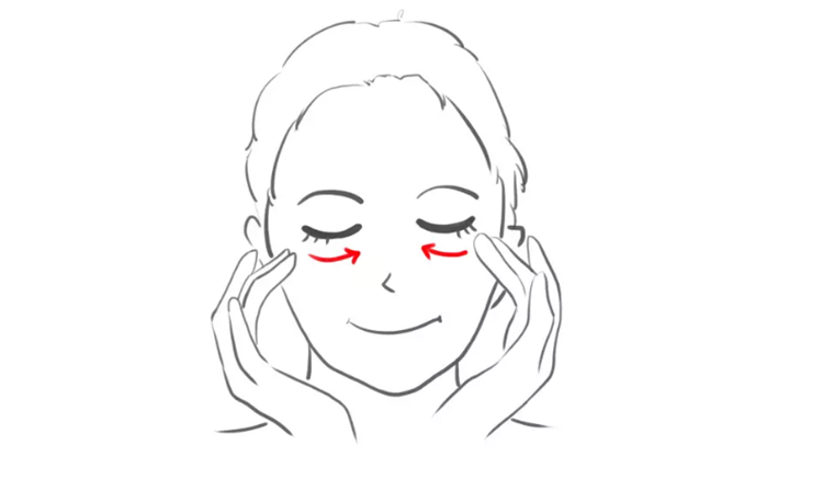 先取适量眼霜在无名指指尖,轻轻匀开之后按照箭头方向点在眼睛周围