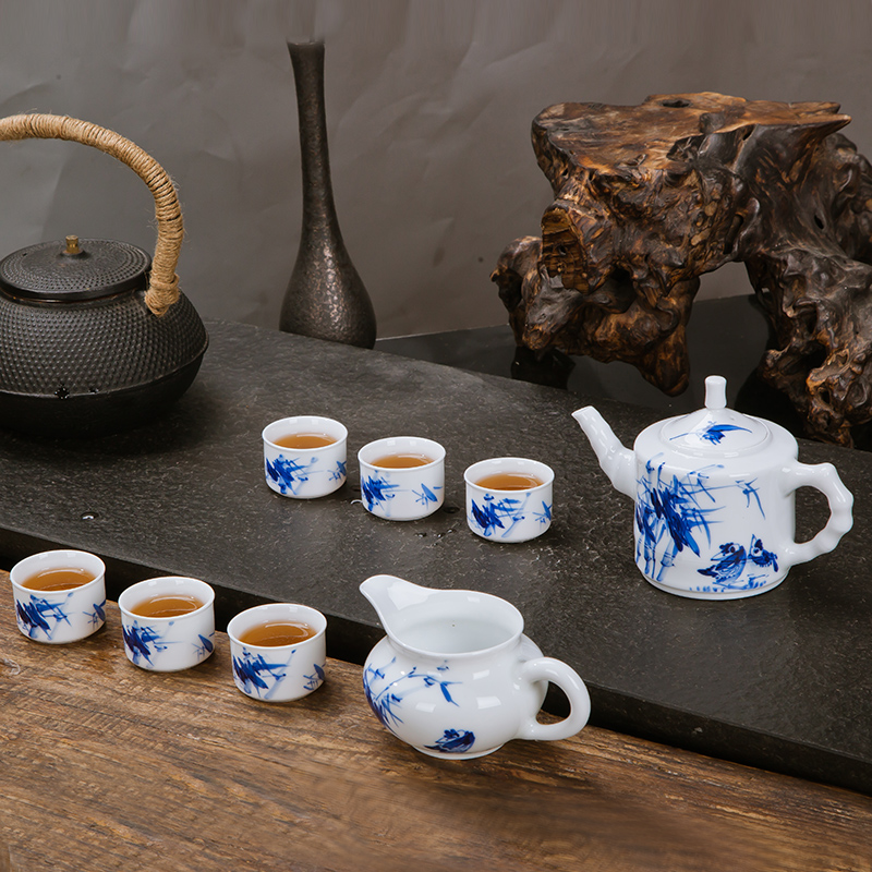 Jingdezhen ceramic hand - made tea set suit household fair simple manual kung fu tea cups of a complete set of the teapot