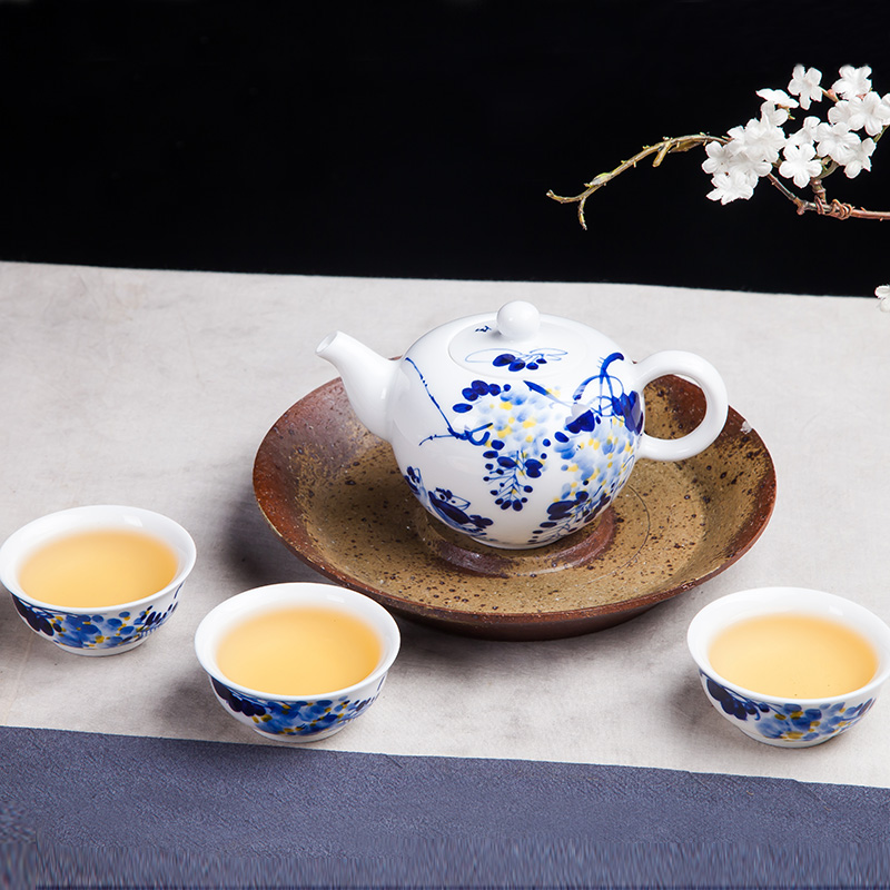 Jingdezhen ceramic hand - made tea set suit household fair simple manual kung fu tea cups of a complete set of the teapot