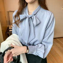 2022 Spring and autumn new blouses light cooked Korean version satin snow-spinning shirt female professional butterfly knot relaxed long sleeve foreign air