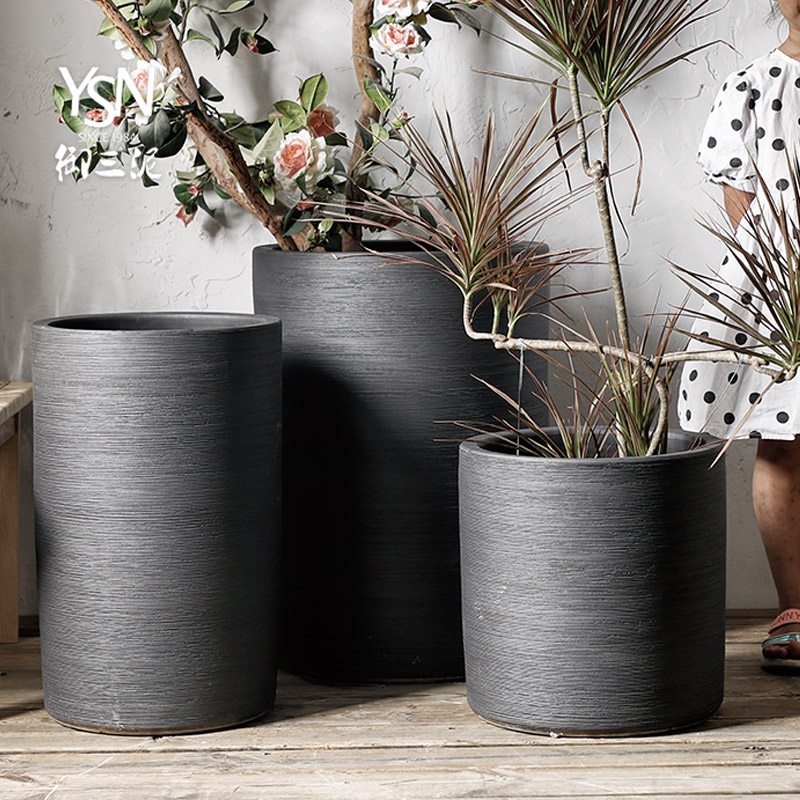 Nordic flowerpot contracted pure black ceramic flower bed modern indoor and is suing decoration to heavy green plant planting place flowerpot