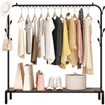 Clothes hanger floor sleeping indoor rack Easy hanging clothes hanger minimalist modern clothes rack room containing clothes rack