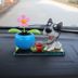 Nước hoa xe hơi trang trí phụ kiện xe hơi sun flower lắc head dog nữ xe ô tô xe nguồn cung cấp xe trang trí Ô tô nội thất Accesseries