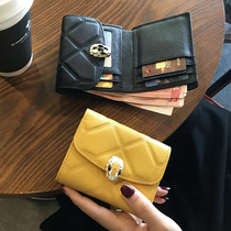Leather wallet womens summer short wallet soft leather niche design high-end thin 2021 new ins wind burst section