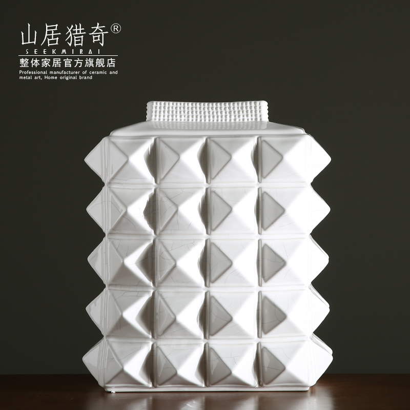 White ceramic flower vases furnishing articles of modern household soft adornment fashion between example sitting room water bottles