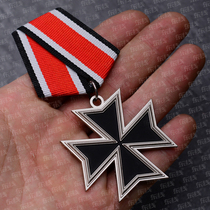 Sud hangs Maltas 57 version of the Oak Leaf Cross Knight Medal