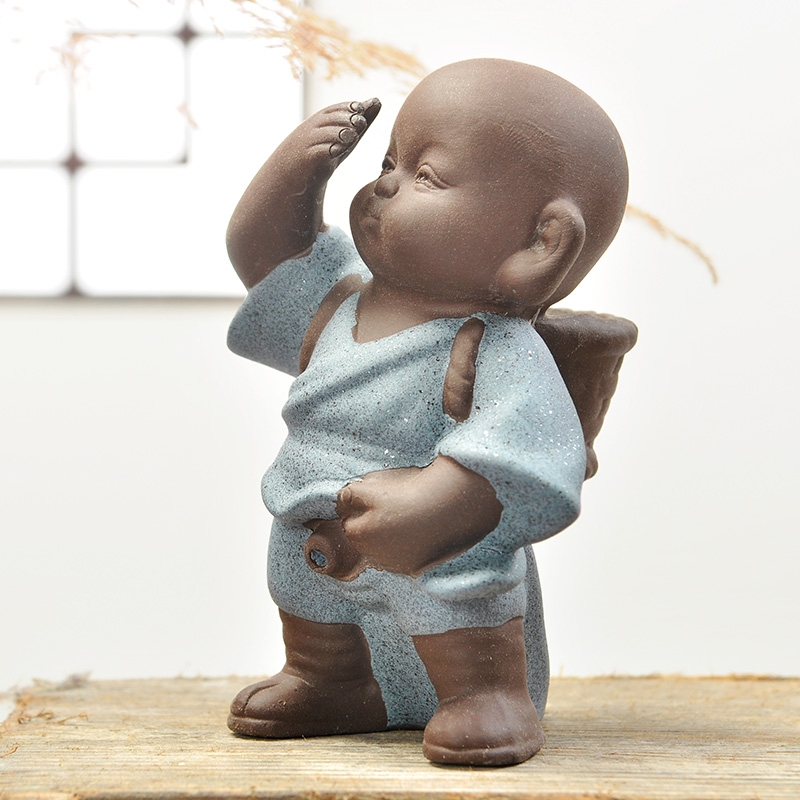 Qiao mu purple sand tea pet kung fu young monk furnishing articles) bracket play tea tea accessories color sand pottery pen rack