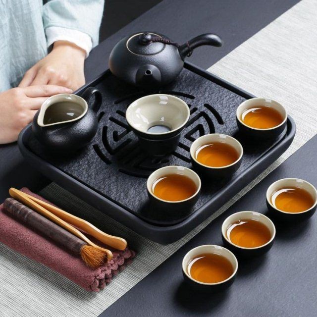 The kitchen together sheng tea set household contracted Japanese kung fu tea set of black ceramic teapot teacup black sharply away The stone