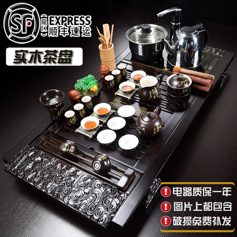 The hutch of a complete set of solid wood tea tray package ceramic kung fu tea tea set household contracted with integrated electric magnetic mixture furnace