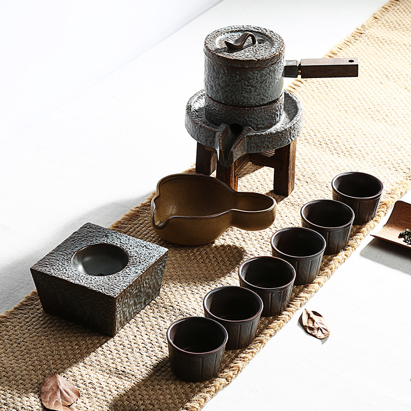 Ding heng creative coarse pottery fortunes of a complete set of tea set stone mill automatic restoring ancient ways is lazy kung fu tea set