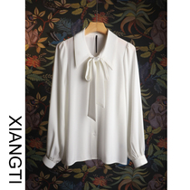 XT shirt French style blouses female spring and autumn tip with long sleeves white pituality design feeling small crowdlantern sleeves satin finish