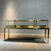 High-end glass counter jewelry emerald display cabinet stainless steel metal light luxury diamond exhibition cabinet customized