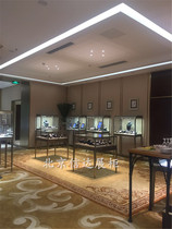 High-grade curved glass display cabinet stainless steel jewelry counter Jade jade pendant boutique display cabinet custom