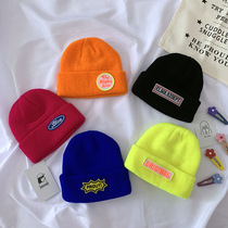Childrens hats Korean autumn and winter new mens and women baby fluorescent color knitted hat label letter pullover hip hip hip hop tide hat