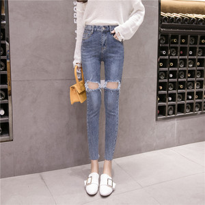 High-rise slim nine-point jeans female washed hole trousers