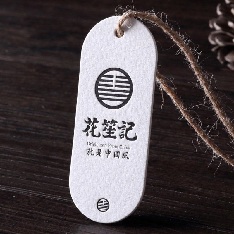 high-end creative personality special-shaped hot stamping embossed cotton paper clothing accessories business card tag design, production and printing