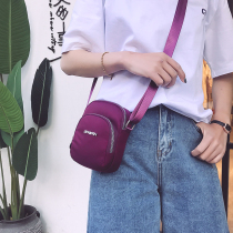 The new Korean version of the casual large-screen mobile phone bag shoulder bag womens Oxford Messenger cloth bag vertical mini mobile phone bag small bag